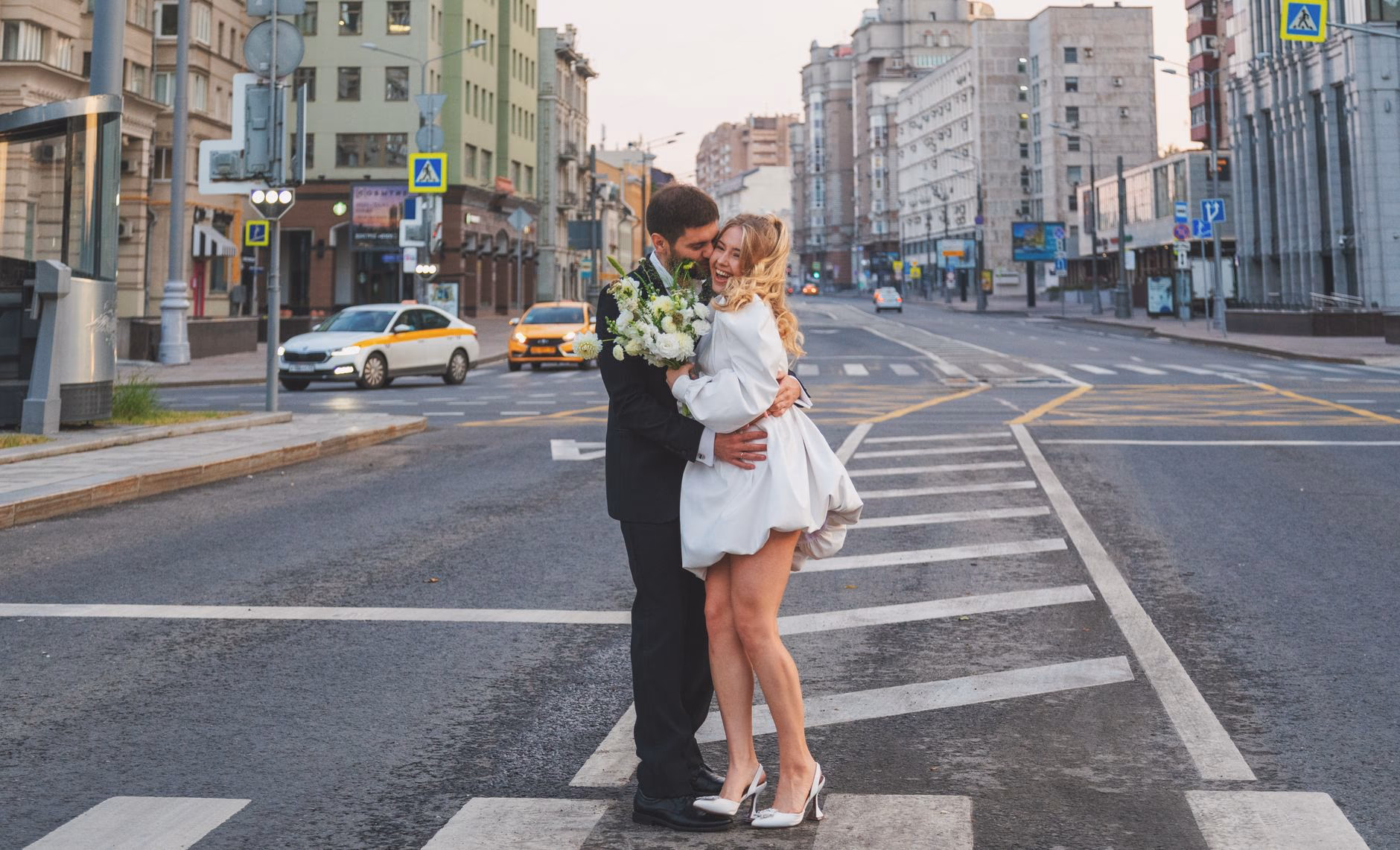 Happy couple celebrating their civil wedding in a European old town